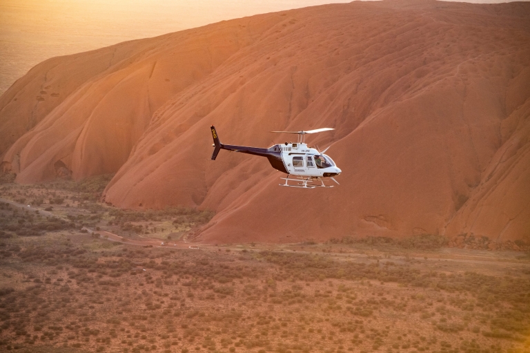Uluru sunrise helicopter flight, Northern Territory © Tourism NT Uluru sunrise helicopter flight, Northern Territory © Tourism NT