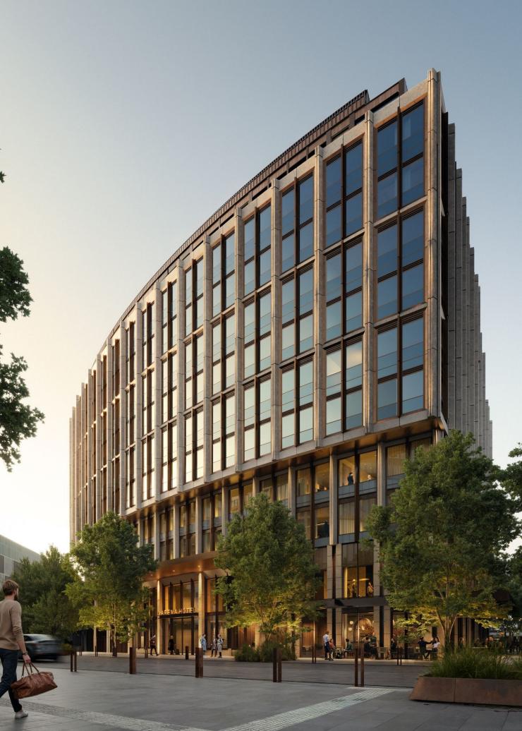 效果图：酒店外立面景观。道路旁的酒店前区种植有树木，澳大利亚首都领地堪培拉，水晶溪奥罗拉酒店 © 水晶溪奥罗拉酒店版权所有