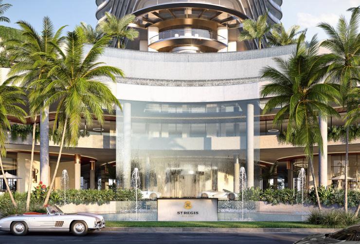 效果图：酒店外立面景观。实景图：酒店外立面呈弧形，中央设有喷泉，两侧种植棕榈树，昆士兰州黄金海岸，瑞吉酒店 © 瑞吉酒店版权所有